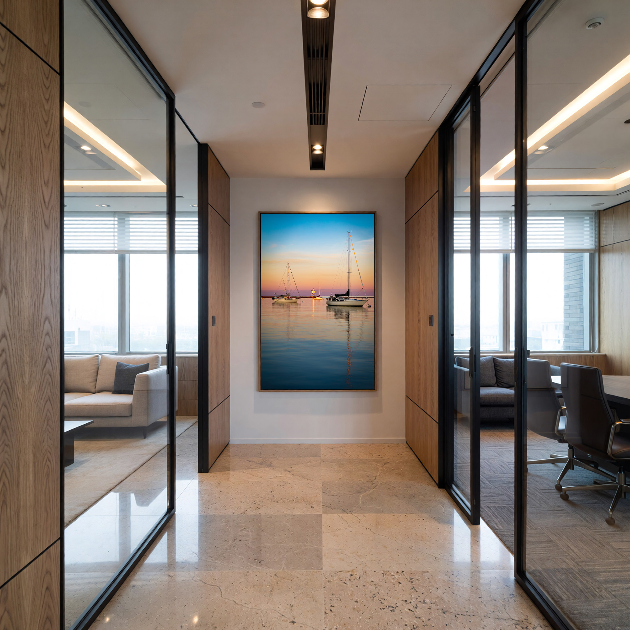 Coastal sailboat artwork framed in a modern office hallway by Dan Sproul